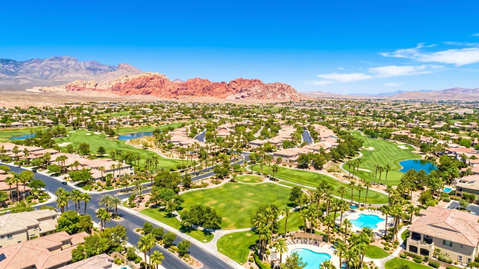 Buffalo Ranch Las Vegas — established northwest single-family neighborhood along Buffalo Drive with mature landscaping and mountain backdrop